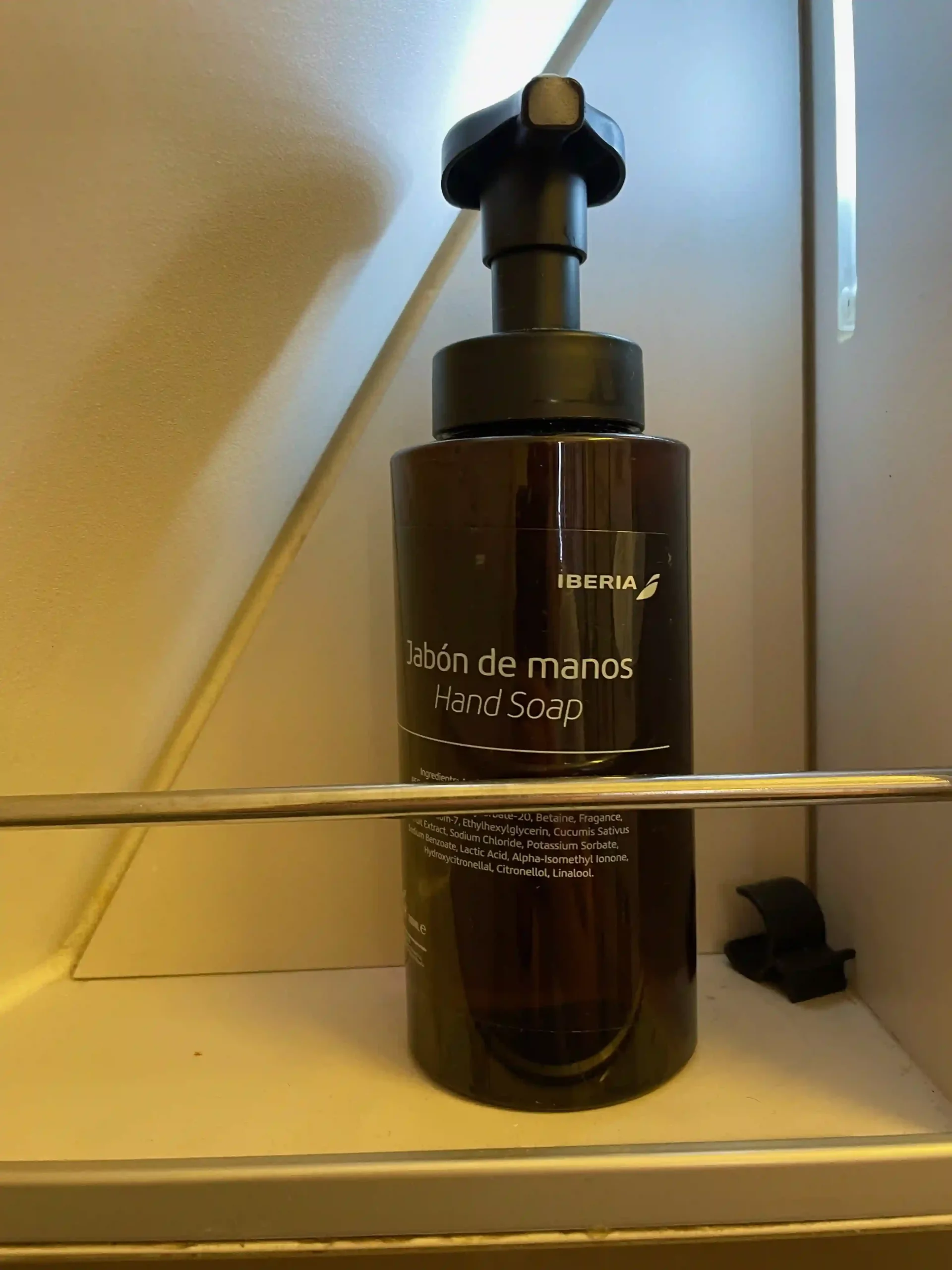a bottle of soap on a shelf