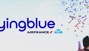 Flying Blue logo next to person celebrating