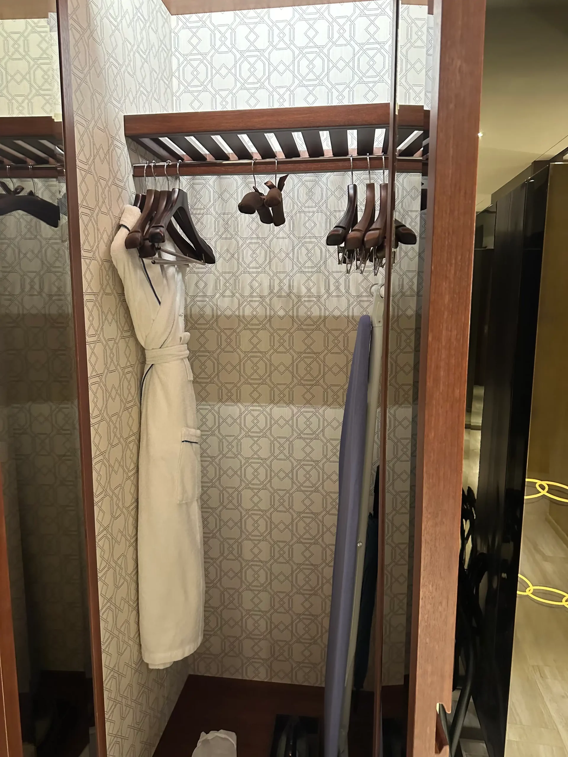 a white robe on a rack