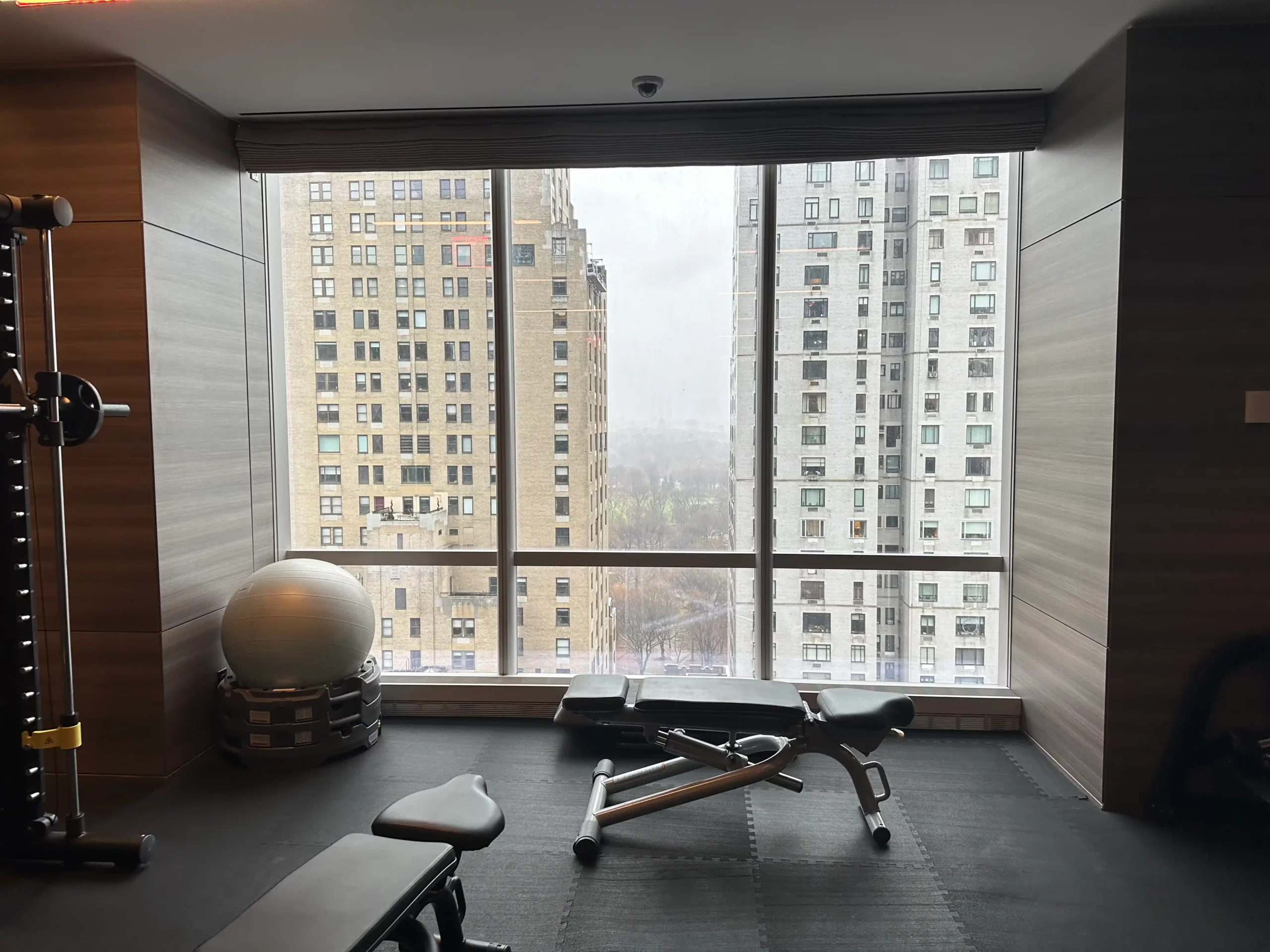 a room with a large window and a gym