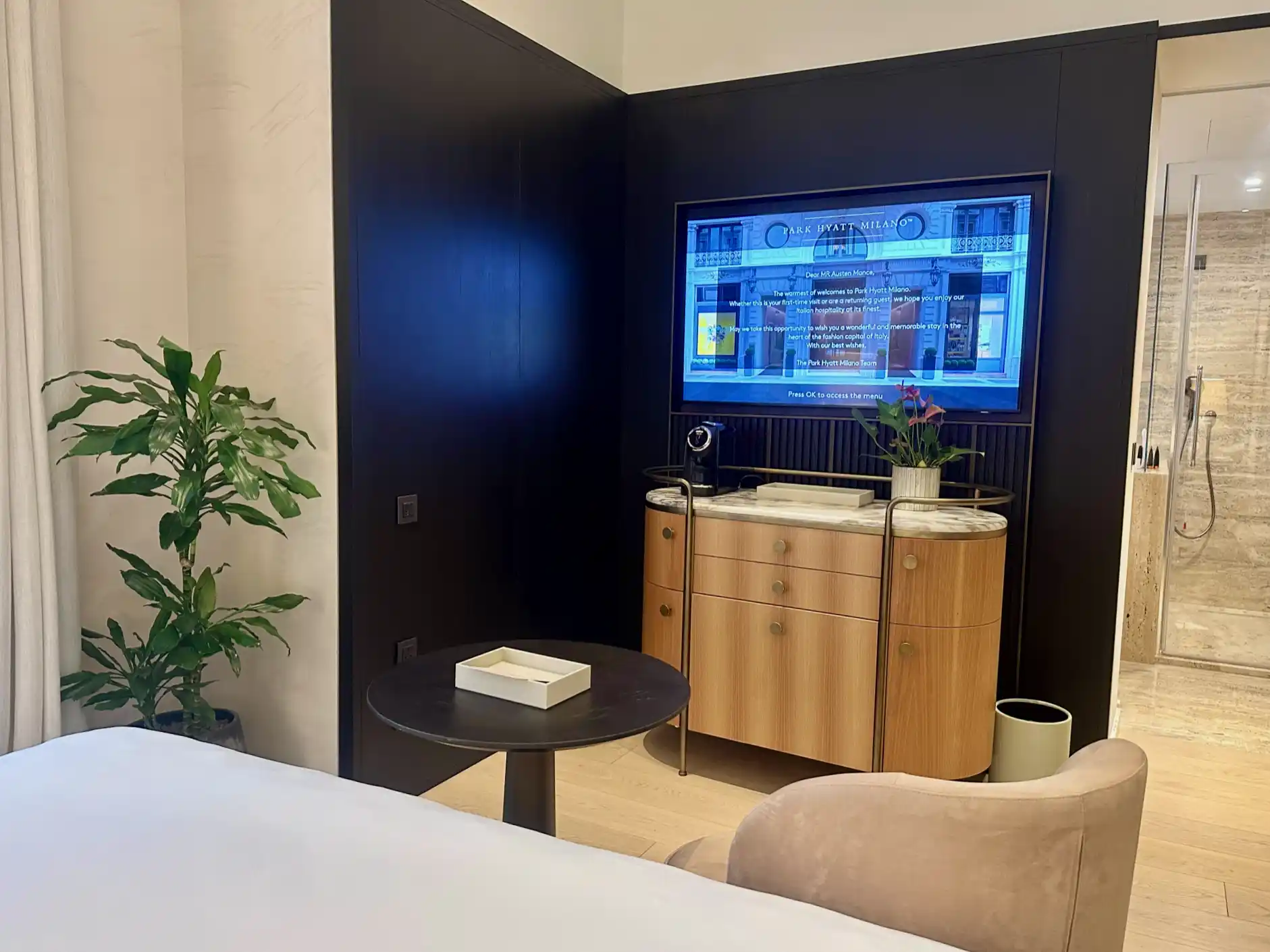 a room with a tv on the wall