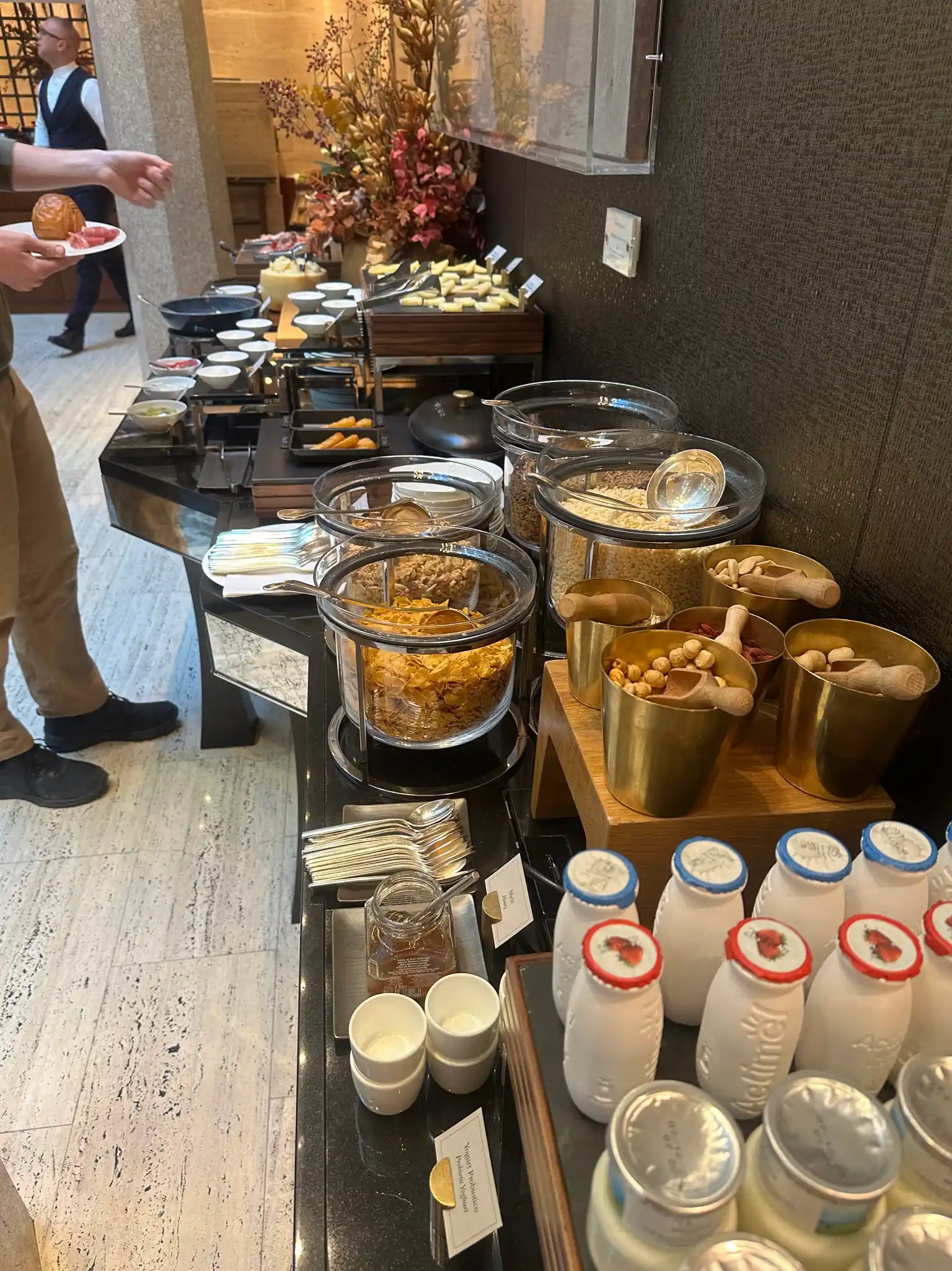 a buffet table with food and drinks