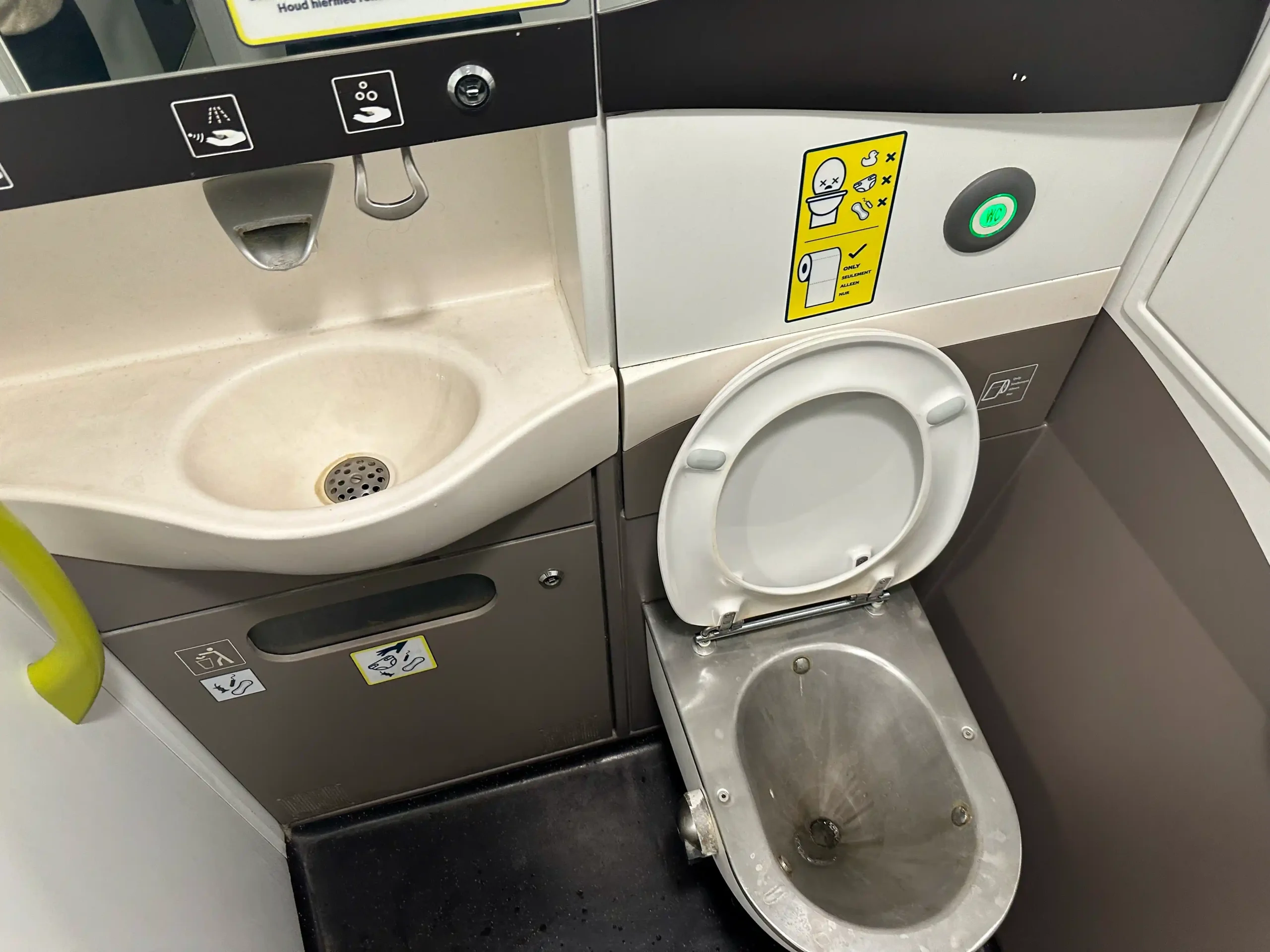 a toilet and sink in a bathroom