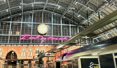 a train station with a clock