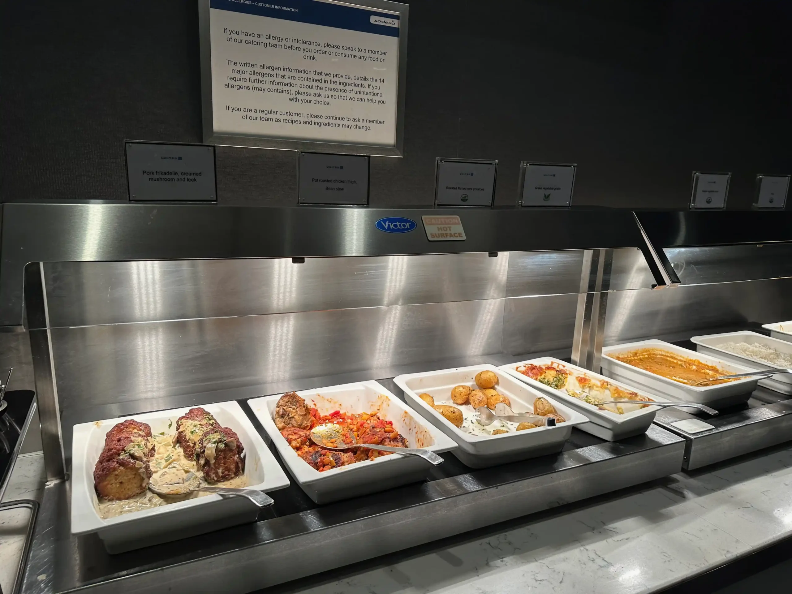 a row of food containers on a counter