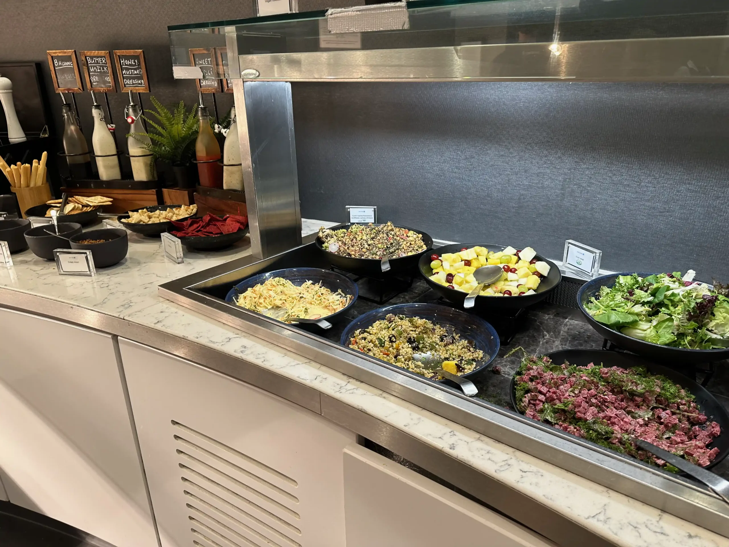 a buffet with food in bowls