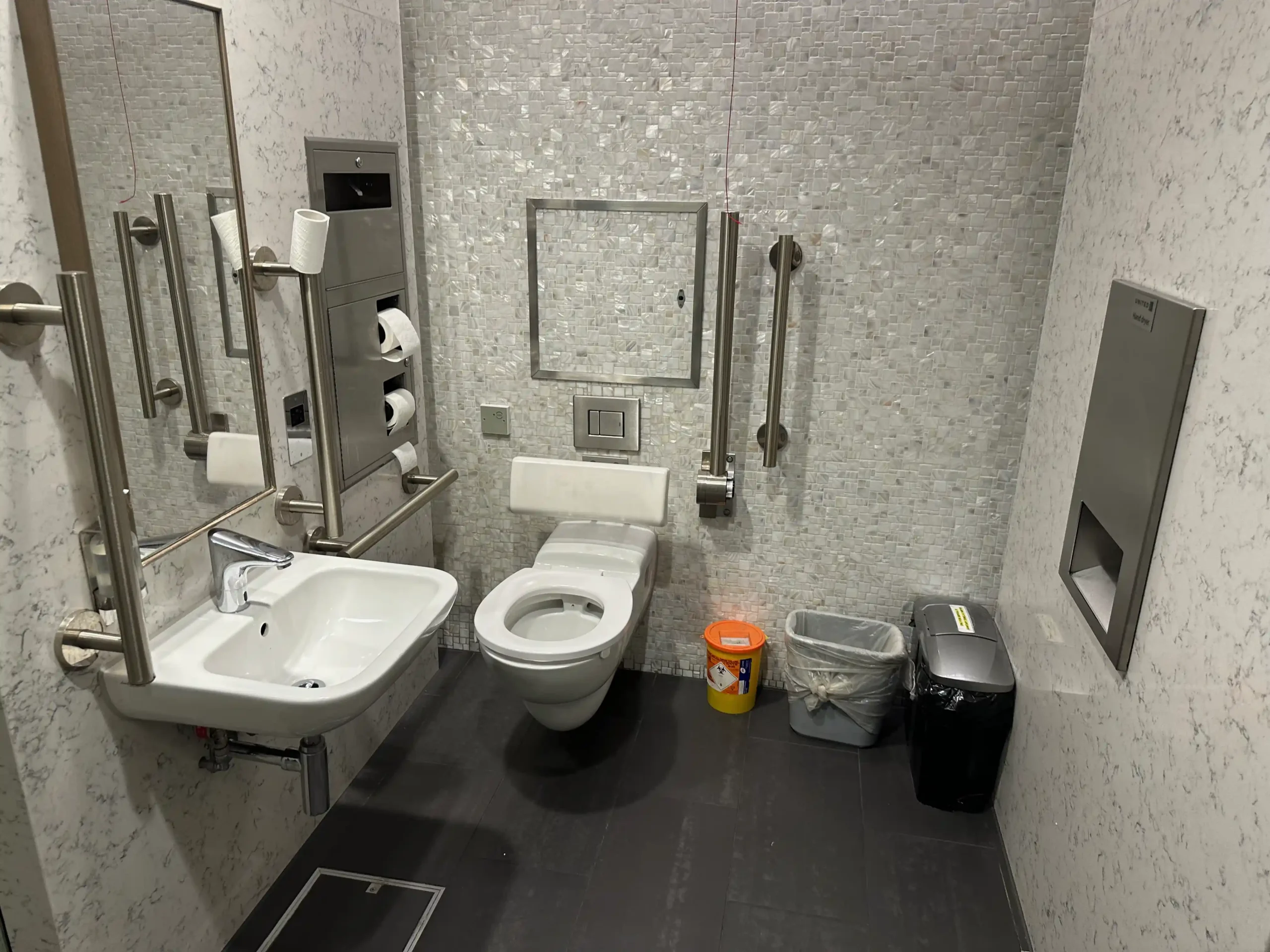 a bathroom with a sink and toilet