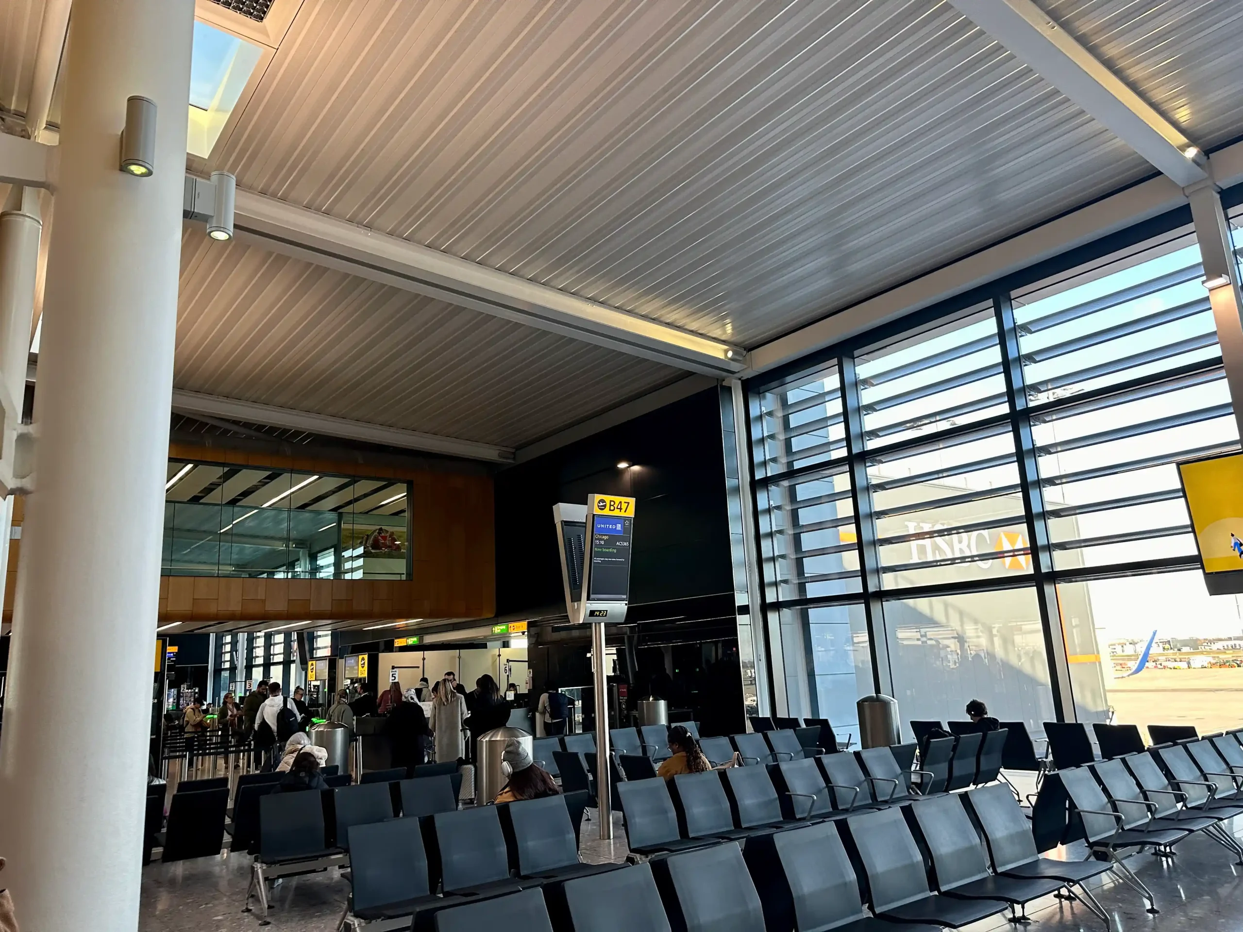 a group of people in an airport terminal