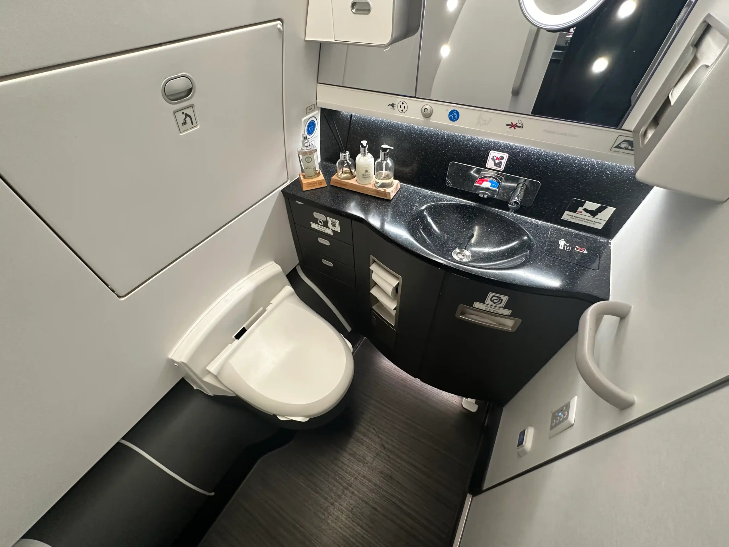 a bathroom with a sink and toilet