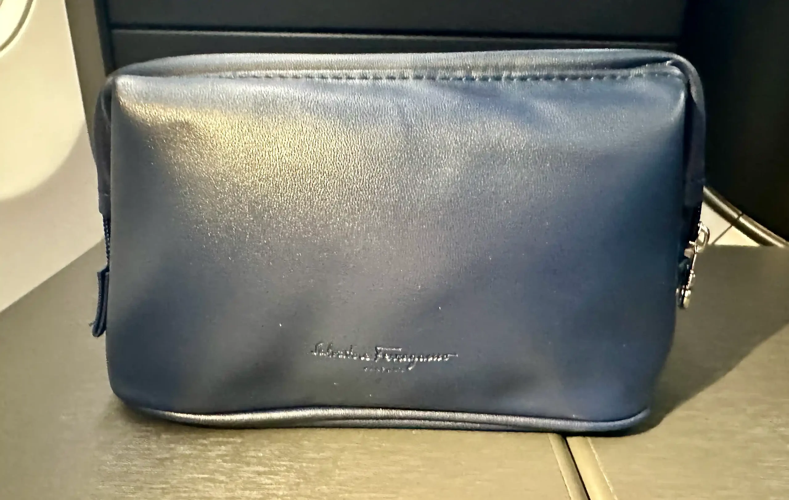 a silver pouch on a table
