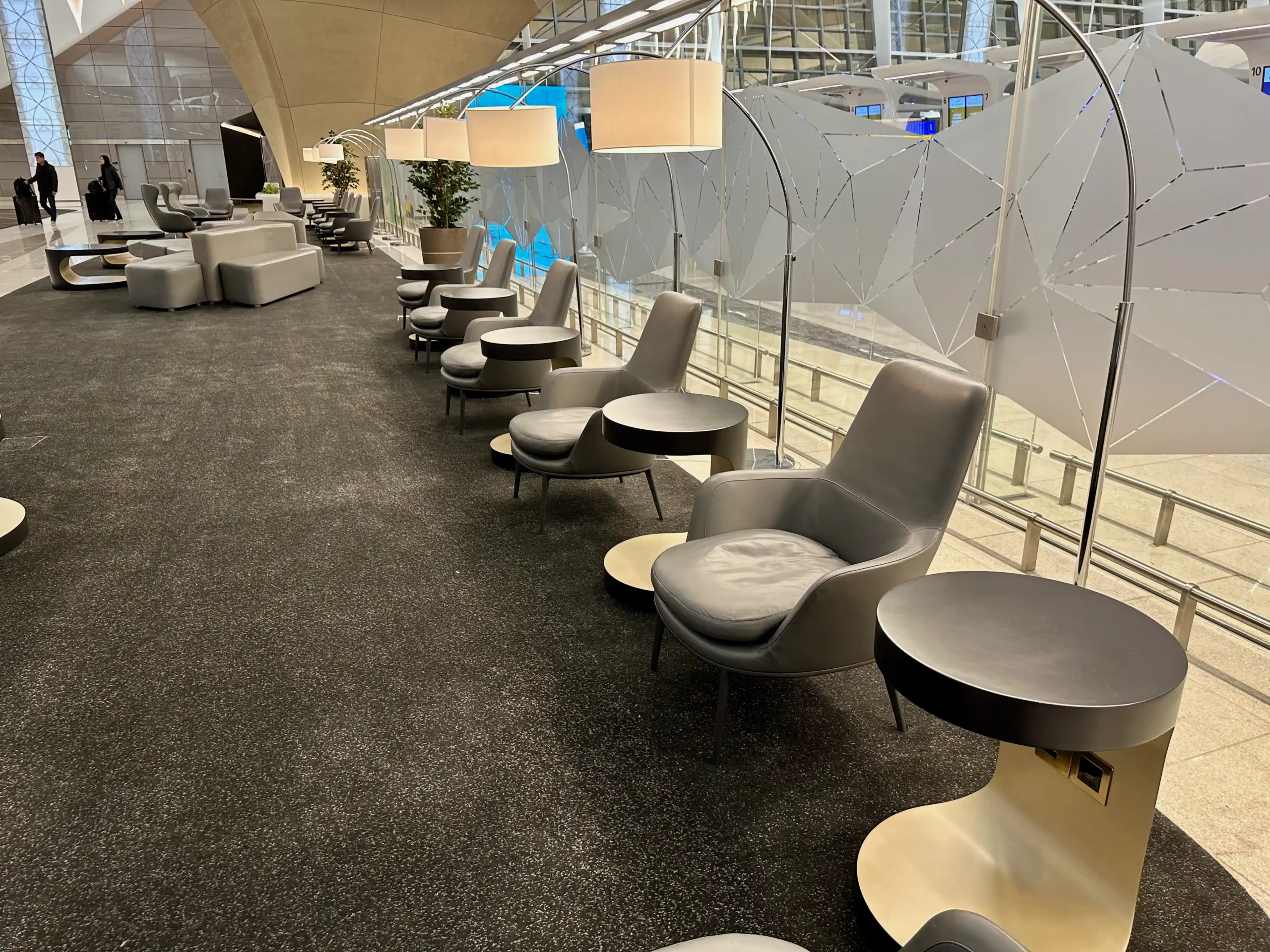 a row of chairs and tables in a room