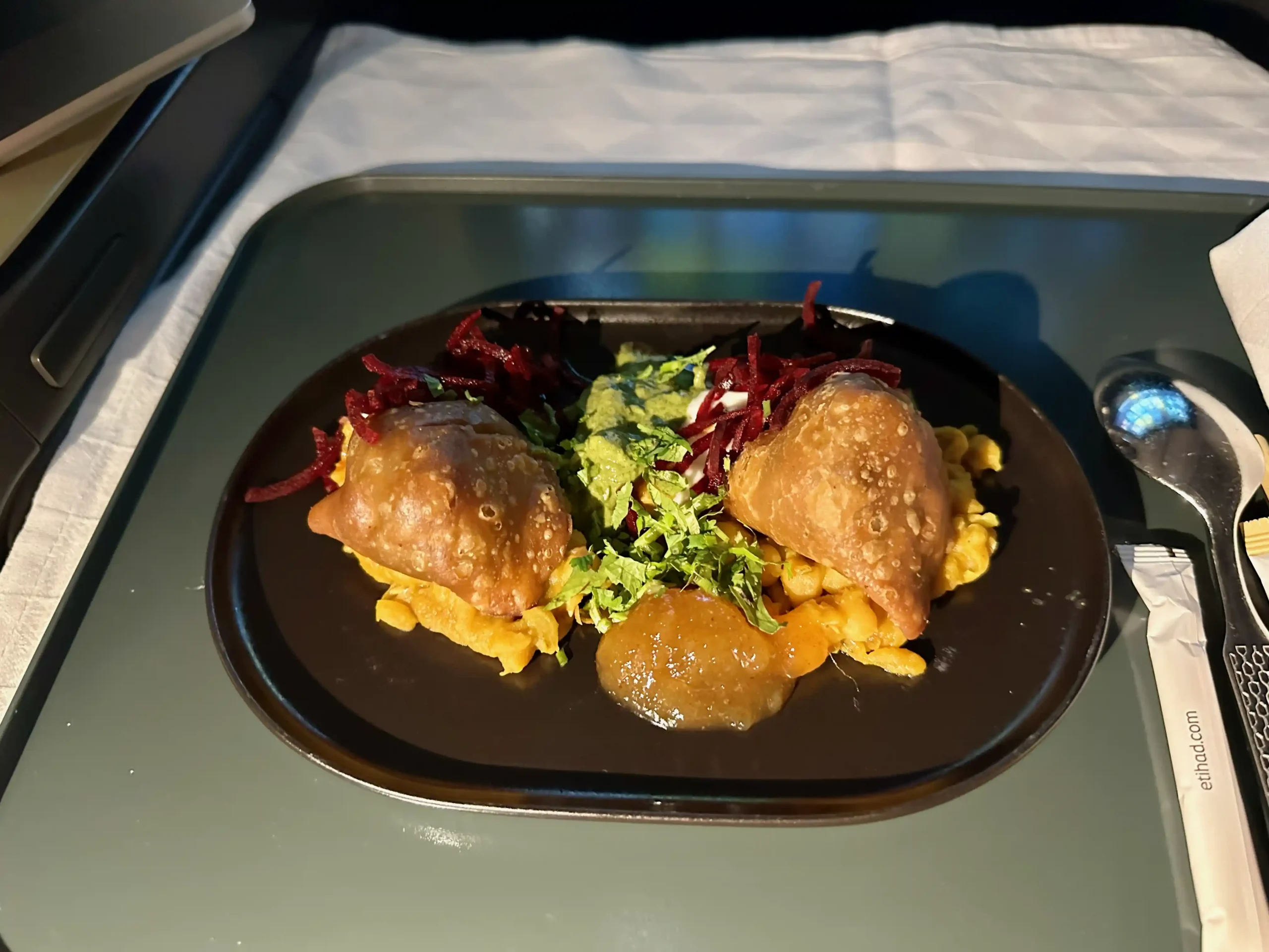 a plate of food on a tray